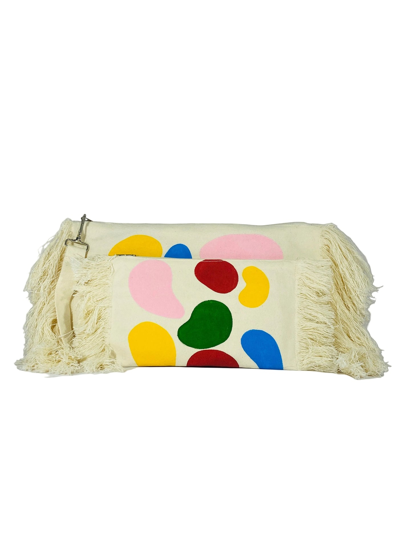 jose ibarra estudio cream cotton clutch with colorful abstract shapes and fringe detail