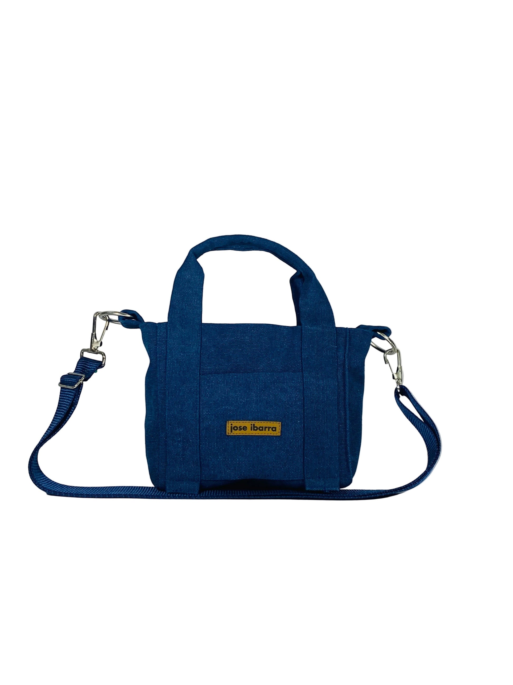 Jose Ibarra blue cotton canvas tote bag, hand-painted design, with internal pockets and strap.