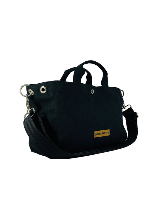 Jose Ibarra Estudio black canvas tote bag with adjustable strap and internal pockets. Medium and large sizes available.