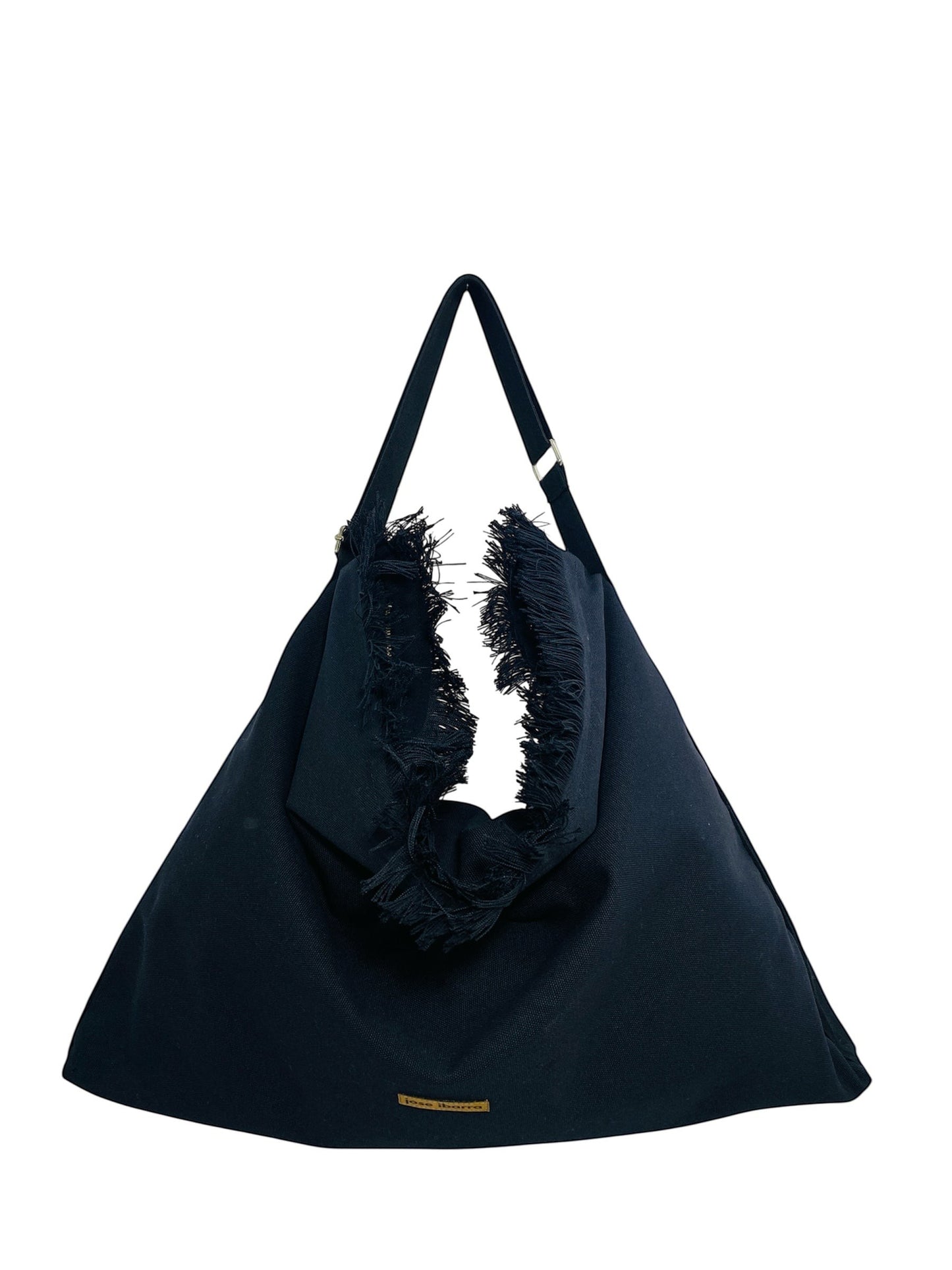 Jose Ibarra Estudio black cotton canvas tote bag with hand-painted art detail and frayed edges, adjustable strap, 60x40cm.