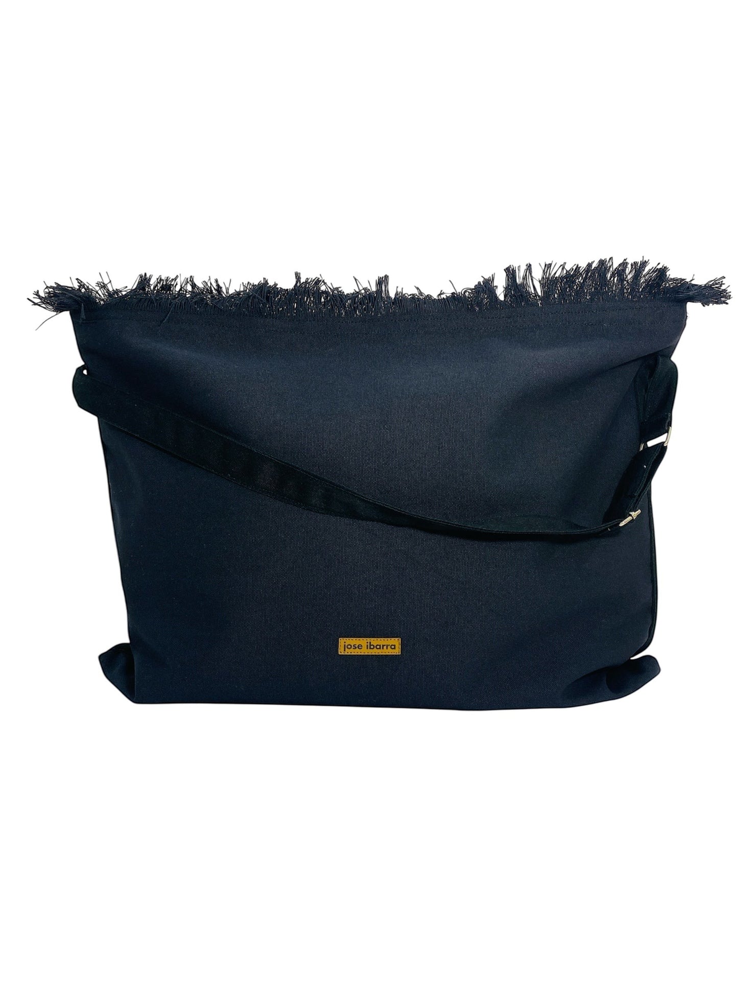 Jose Ibarra Estudio black cotton canvas tote bag with hand-painted art, frayed edges, and adjustable strap.