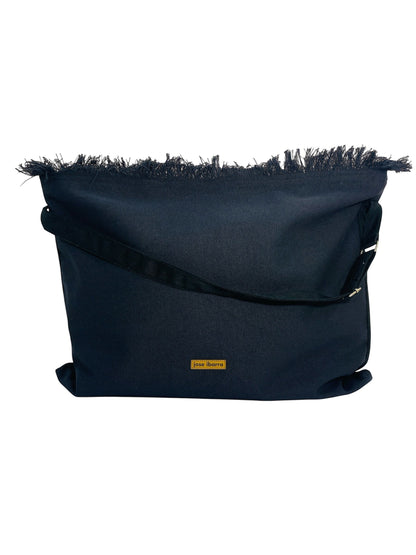 Jose Ibarra Estudio black cotton canvas tote bag with hand-painted art, frayed edges, and adjustable strap.