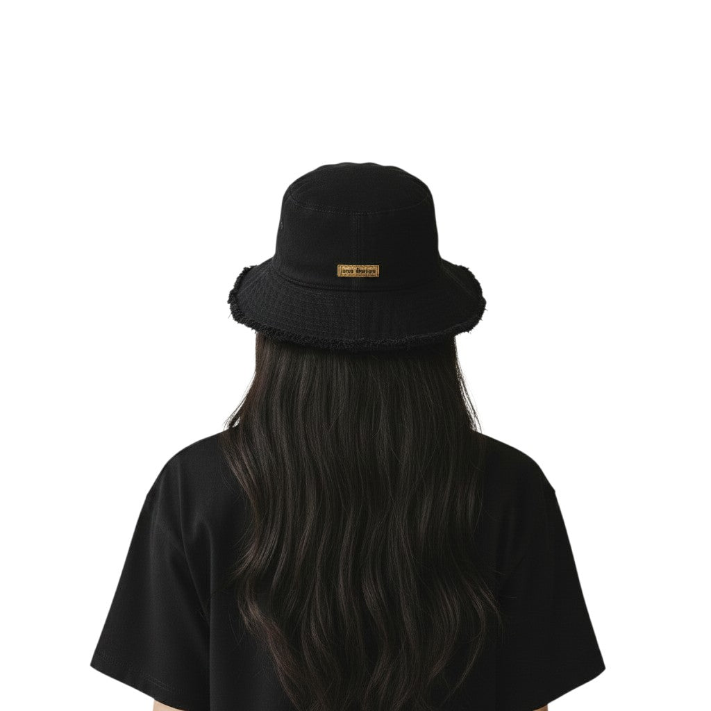 jose ibarra estudio black cotton bucket hat with frayed edge and gold logo detail