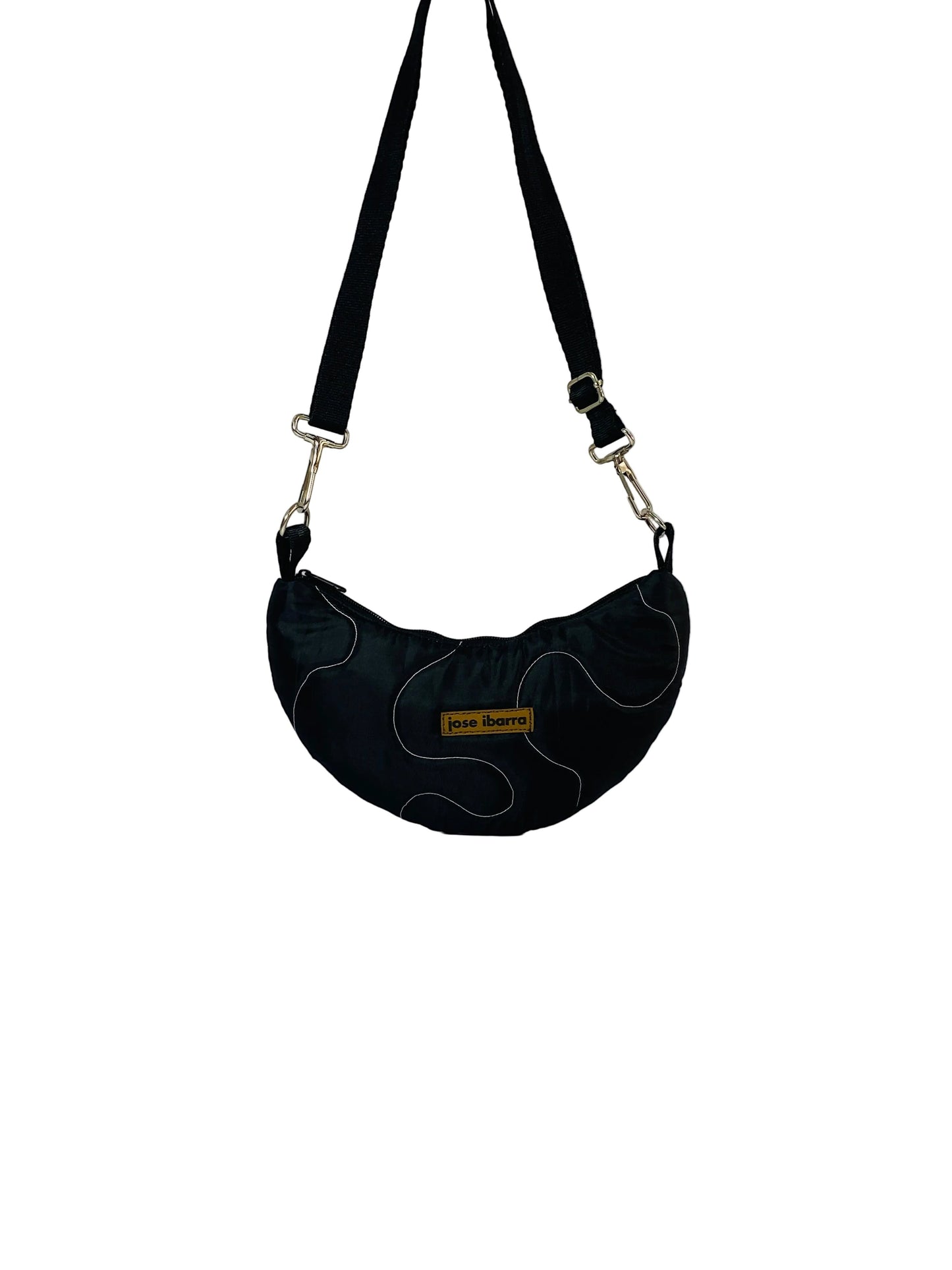 Jose Ibarra Estudio black cotton Luna bag with white stitching detail and adjustable strap. Hand-painted design.