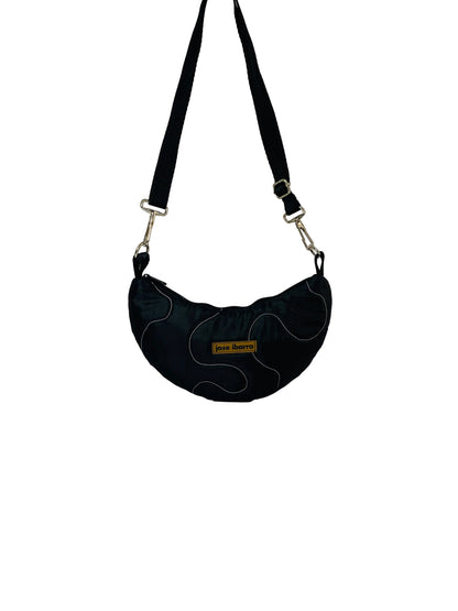 Jose Ibarra Estudio black cotton Luna bag with white stitching detail and adjustable strap. Hand-painted design.