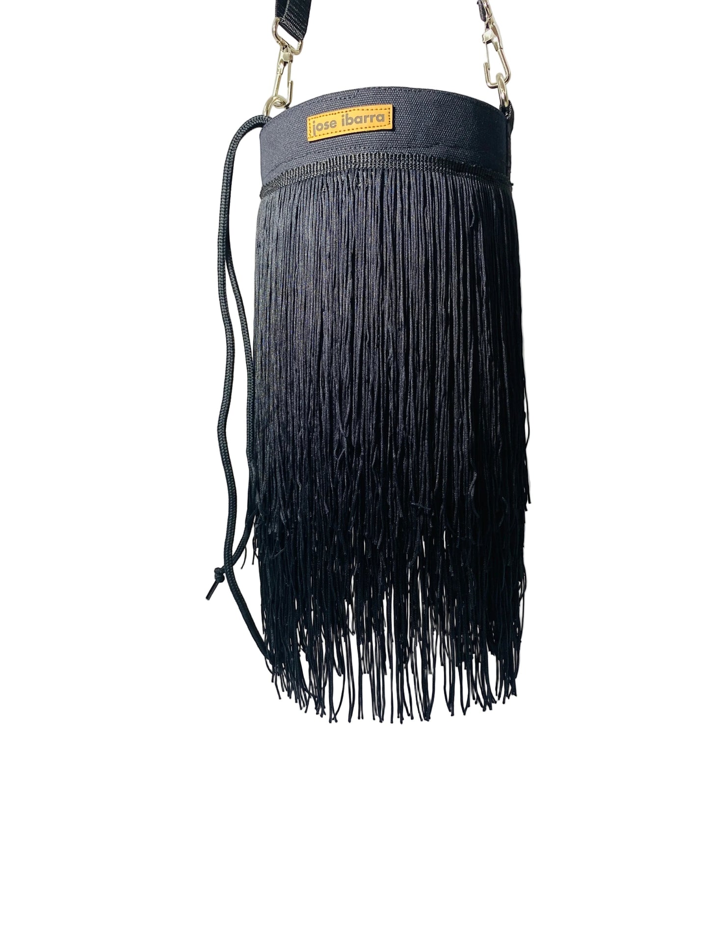Jose Ibarra Estudio black cotton bucket bag with long fringe detail and adjustable strap.