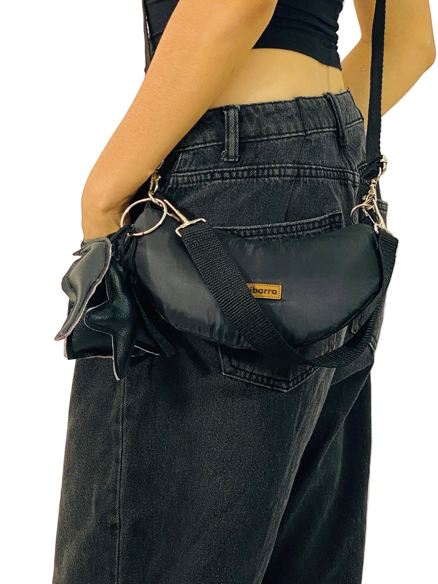 Jose Ibarra Estudio black Luna crossbody bag with star detail and adjustable strap, made from thick cotton with hand-painted art.