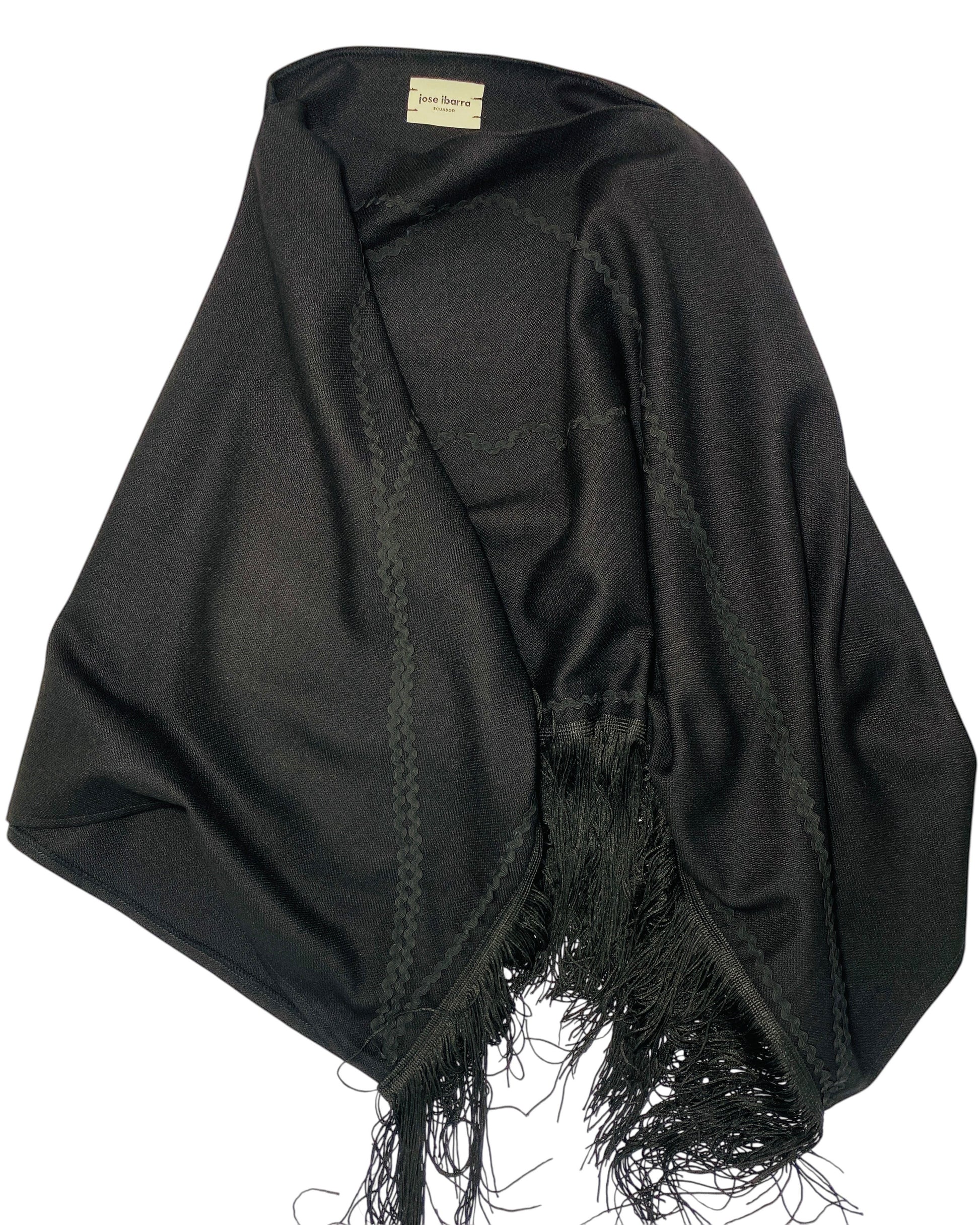 Jose Ibarra Estudio black wool blend shawl with zigzag stitching and artisanal fringe