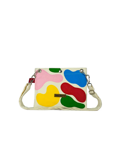 Jose Ibarra Estudio cream canvas pouch with hand-painted abstract colourful blobs, includes strap. 23x17 cm.
