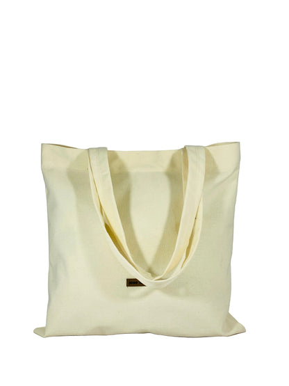 Jose Ibarra Estudio natural canvas tote bag, hand-painted with an internal pocket. Unique artisanal design.