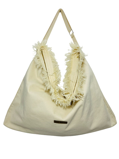 Jose Ibarra Estudio cream cotton canvas tote bag with frayed edges and adjustable strap, hand-painted design.