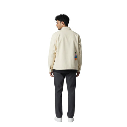 Jose Ibarra Estudio cream 100% cotton canvas jacket with hand-painted Andean figure motif, unisex design.