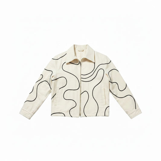 Jose Ibarra Estudio cream 100% cotton canvas jacket with hand-painted wavy line stitching detail, unisex design.