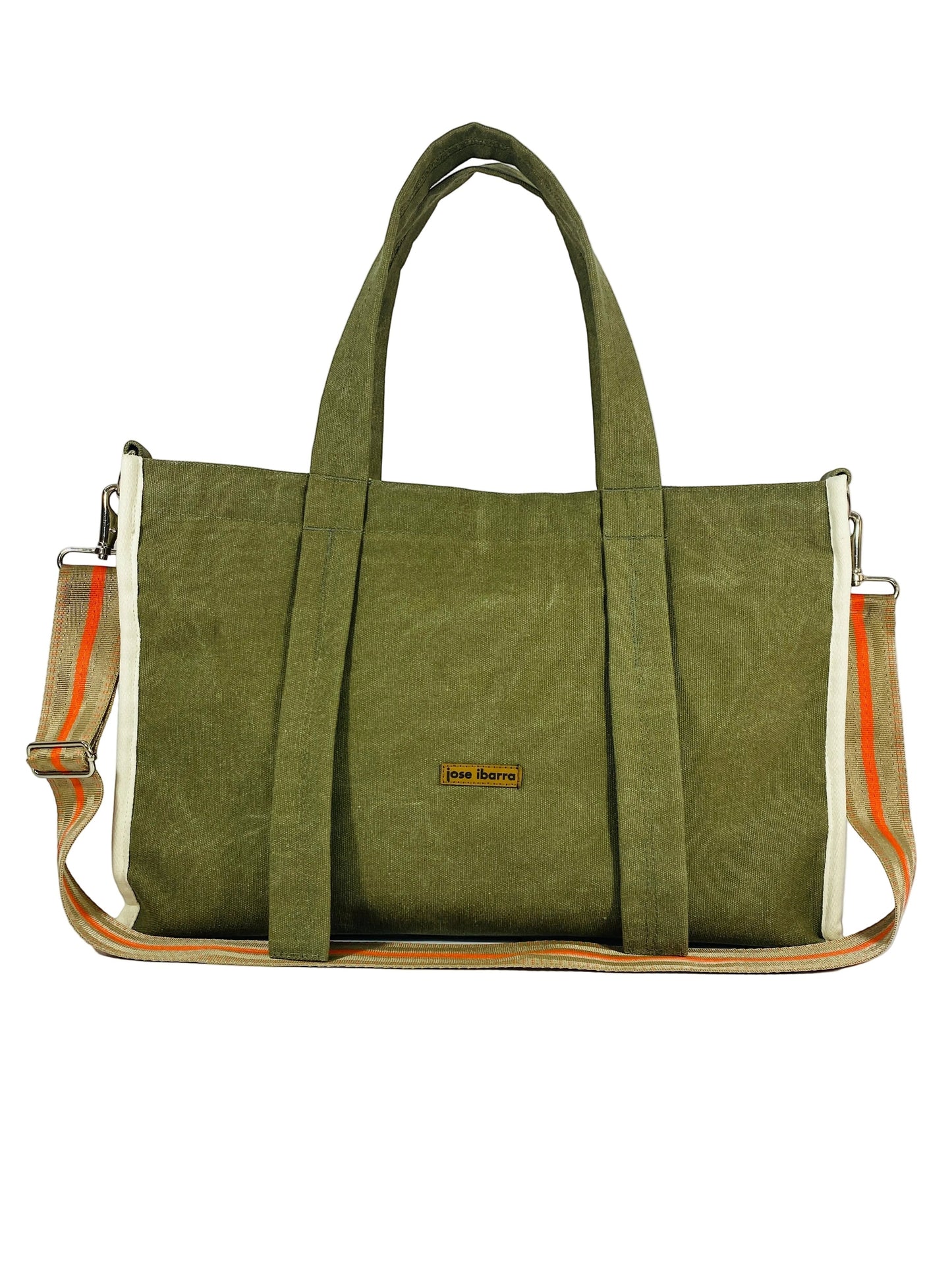 Jose Ibarra Estudio DUA olive green canvas tote bag with white and orange striped trim and adjustable strap.