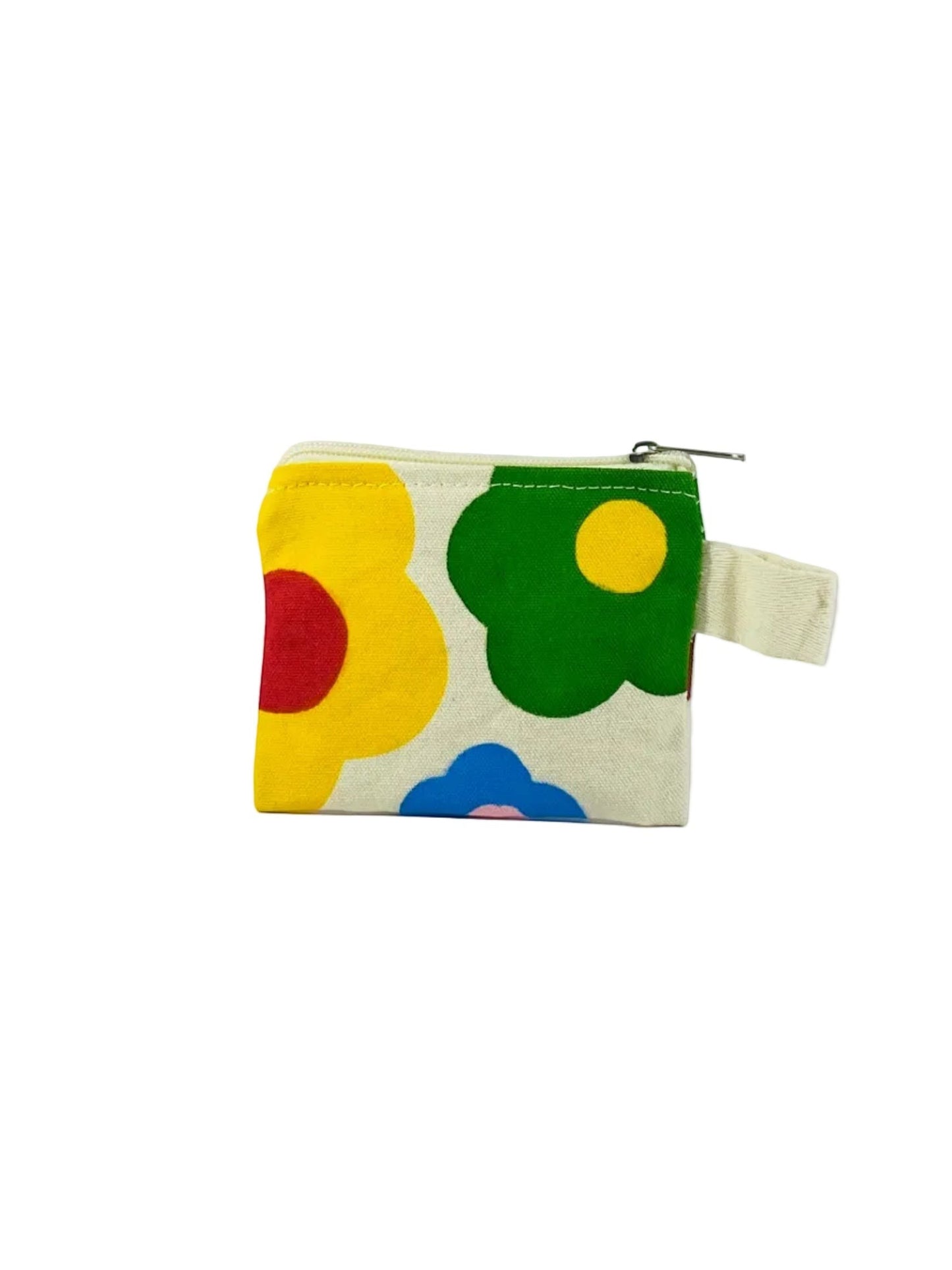 Jose Ibarra Estudio cream canvas coin purse with hand-painted floral pattern in yellow, red, green, blue, and pink. Features a zipper closure and loop handle.