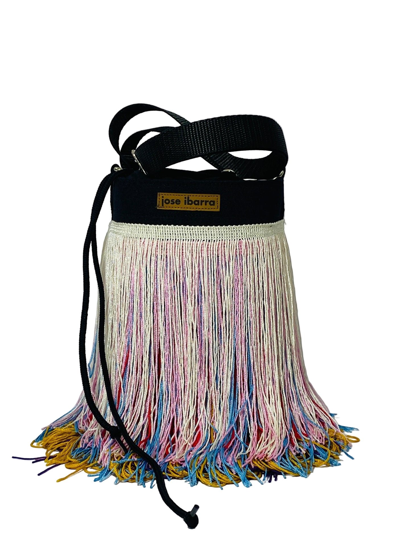 Jose Ibarra Estudio black canvas bucket bag with multicolor fringe detailing and adjustable strap.