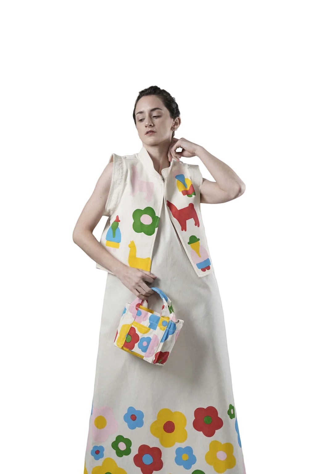 Jose Ibarra Estudio cream 100% cotton canvas vest, hand-painted with colorful folk art motifs like llamas and flowers. Lined with cotton.