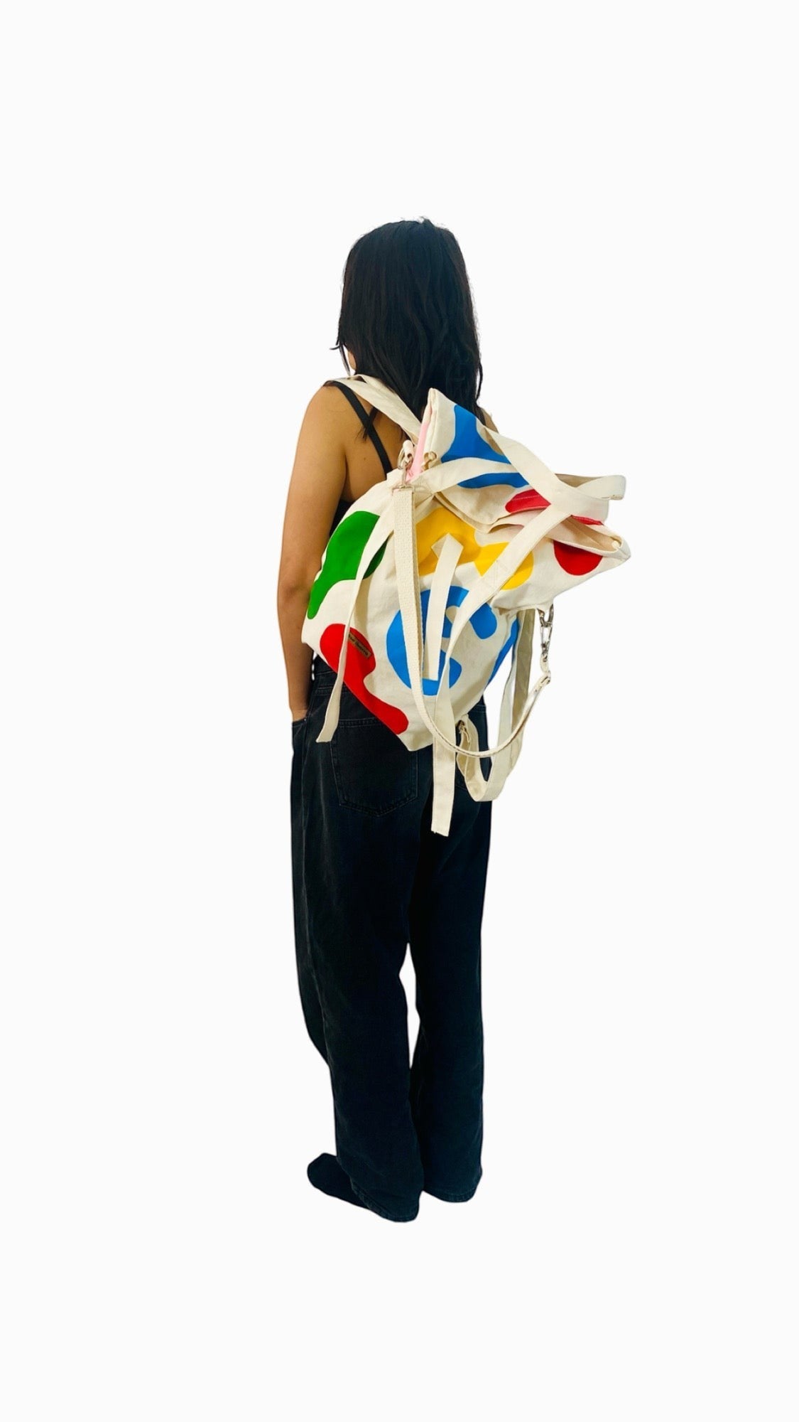 Jose Ibarra Estudio white cotton tote backpack with hand-painted colorful abstract shapes, convertible style, 60x40cm.