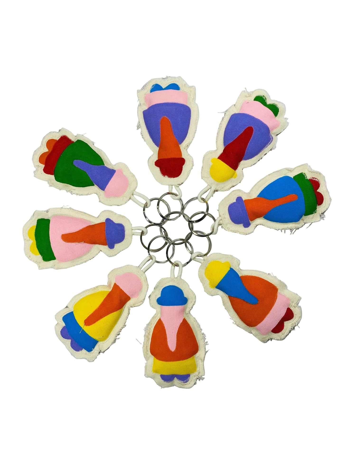 Jose Ibarra Estudio handmade fabric keychains with colorful abstract designs and figures. Thick cotton canvas, hand-painted.