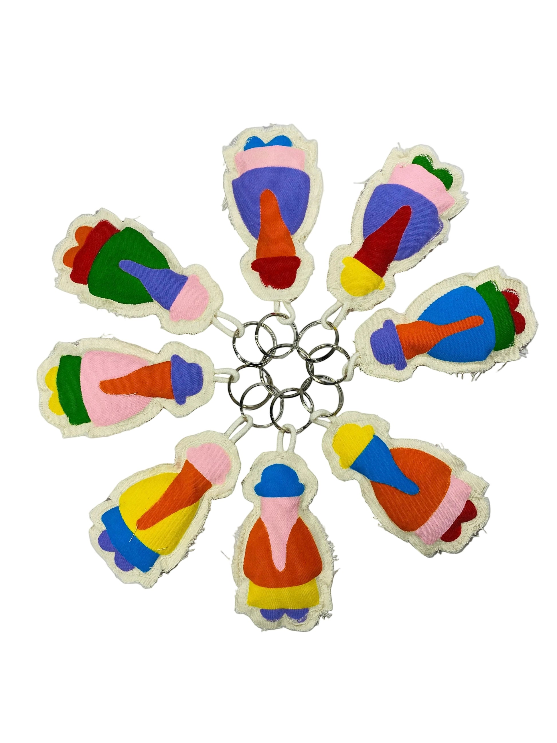Jose Ibarra Estudio handmade fabric keychains with colorful abstract designs and figures. Thick cotton canvas, hand-painted.
