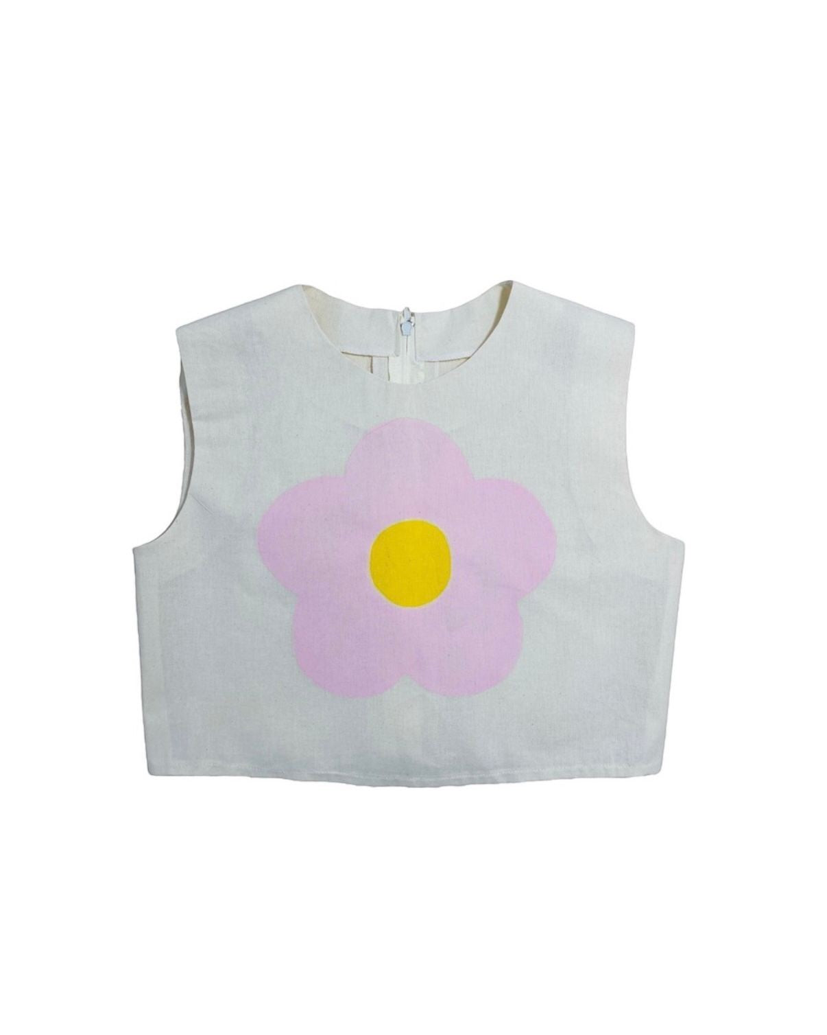 Jose Ibarra Estudio cream linen crop top with a large pink and yellow hand-painted flower graphic.