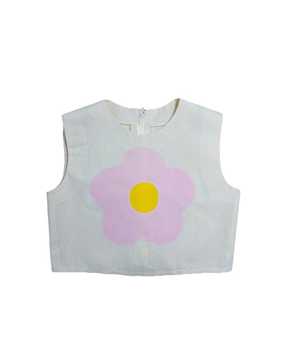 Jose Ibarra Estudio cream linen crop top with a large pink and yellow hand-painted flower graphic.