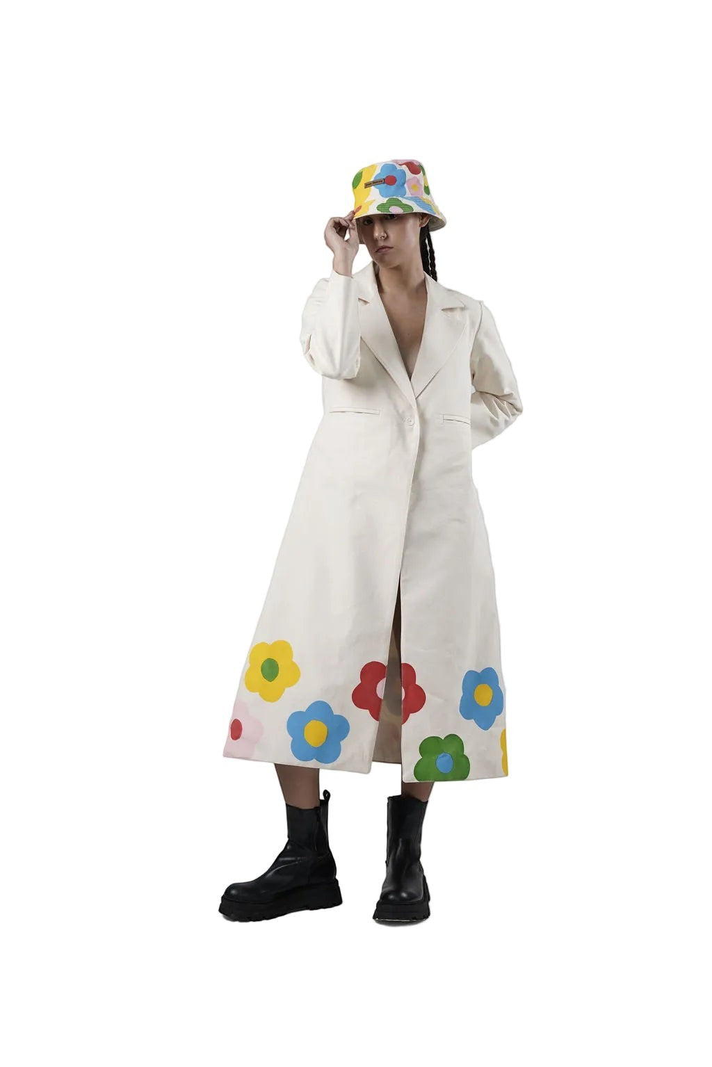 Jose Ibarra Estudio cream 100% cotton canvas long coat, hand-painted with colourful flowers on the hem. Model wearing size S.