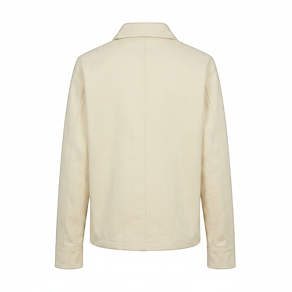 Jose Ibarra Estudio natural canvas unisex jacket made of 100% cotton with cotton lining. Classic collar and long sleeves.