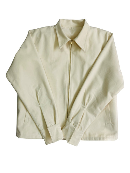 Jose Ibarra Estudio natural canvas unisex jacket made from 100% cotton with a cotton lining and gold zipper.