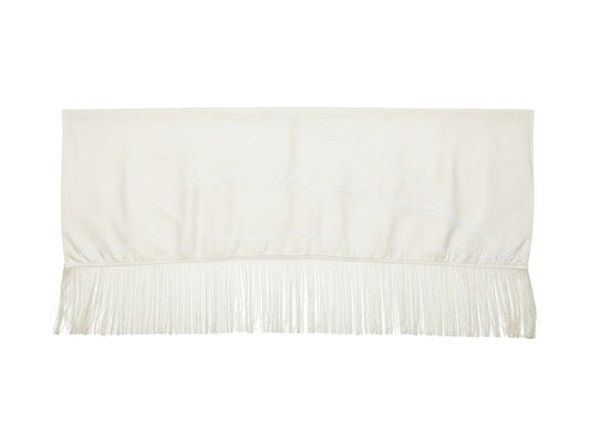 Jose Ibarra Estudio natural cream cotton and wool blend shawl with zigzag trim and fringed hem, embroidered with mountain peaks.