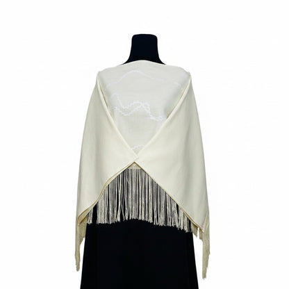 Jose Ibarra Estudio natural cream wool blend shawl with zigzag trim and fringe detail