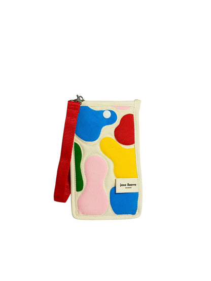 Jose Ibarra Estudio cream cotton phone pouch with colorful abstract hand-painted shapes and red strap.