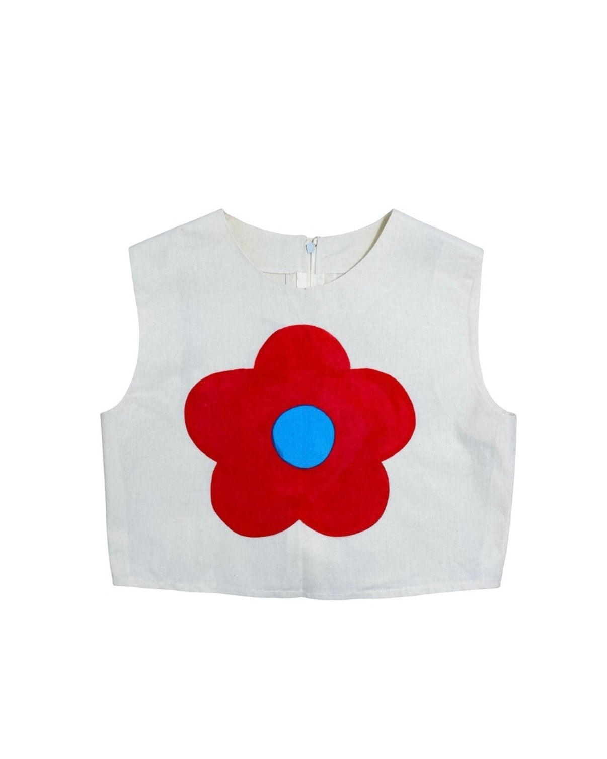 Jose Ibarra Estudio white 100% cotton sleeveless crop top with a red flower and blue center, hand-painted.