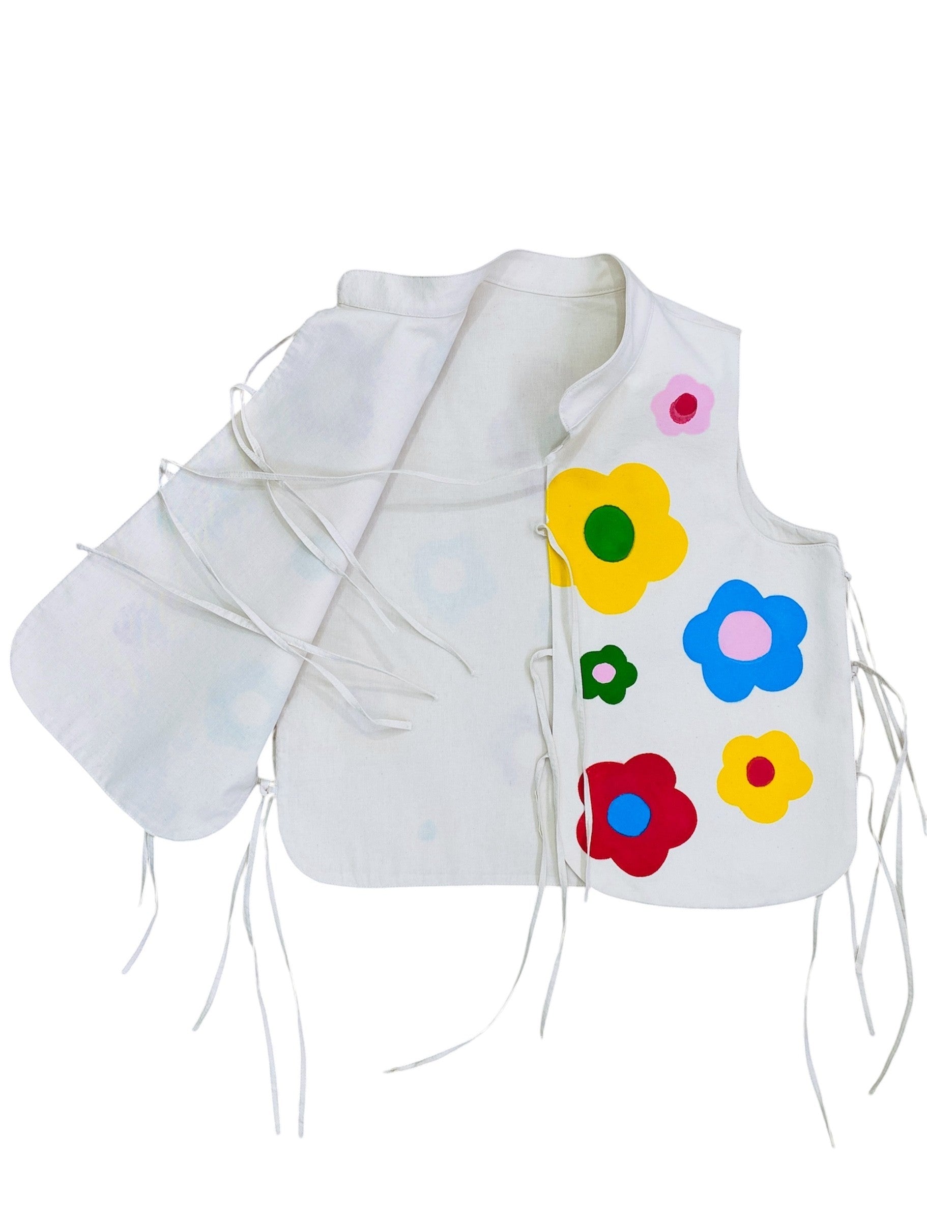 Jose Ibarra Estudio white 100% cotton canvas vest, hand-painted with colorful floral appliques and tie closures.