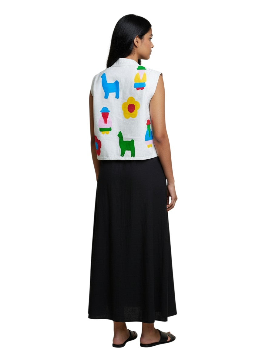 Jose Ibarra Estudio white 100% cotton canvas vest, hand-painted with colorful llamas, flowers, and figures.