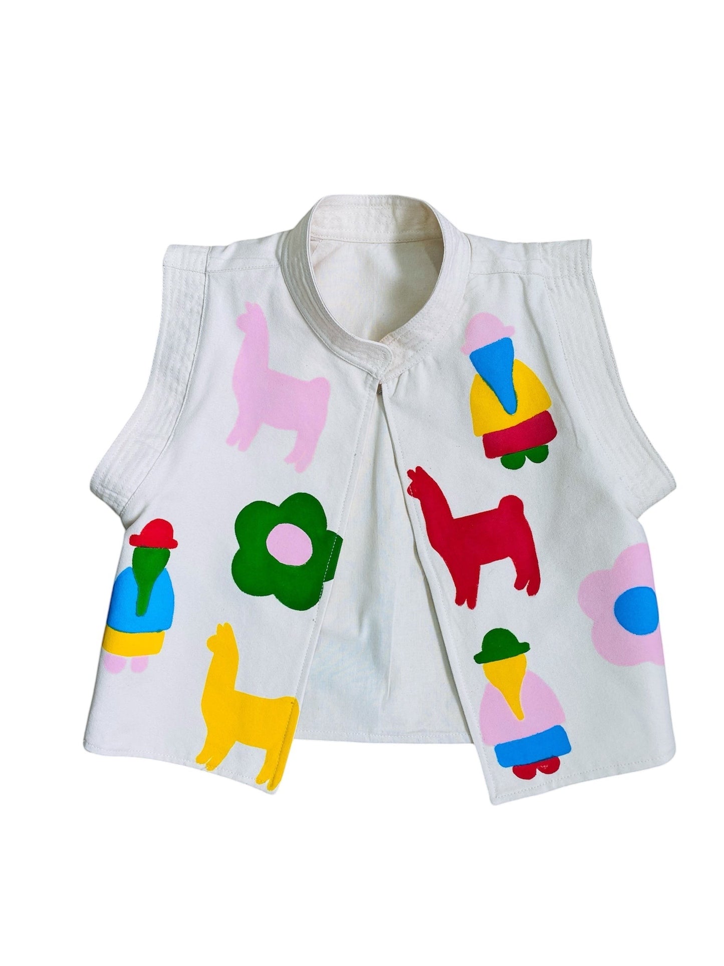 Jose Ibarra Estudio white 100% cotton canvas vest, hand-painted with colorful llamas, people, and flowers. Sleeveless with a mandarin collar.