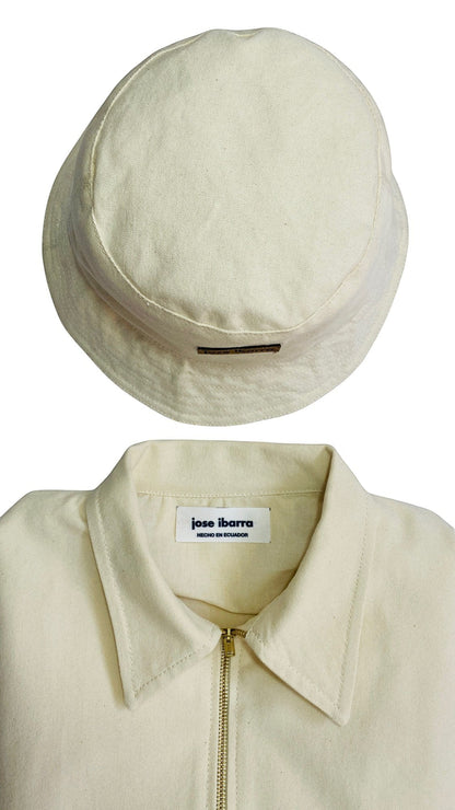 Jose Ibarra natural canvas unisex jacket with zip closure and matching bucket hat. Both items made of 100% cotton.