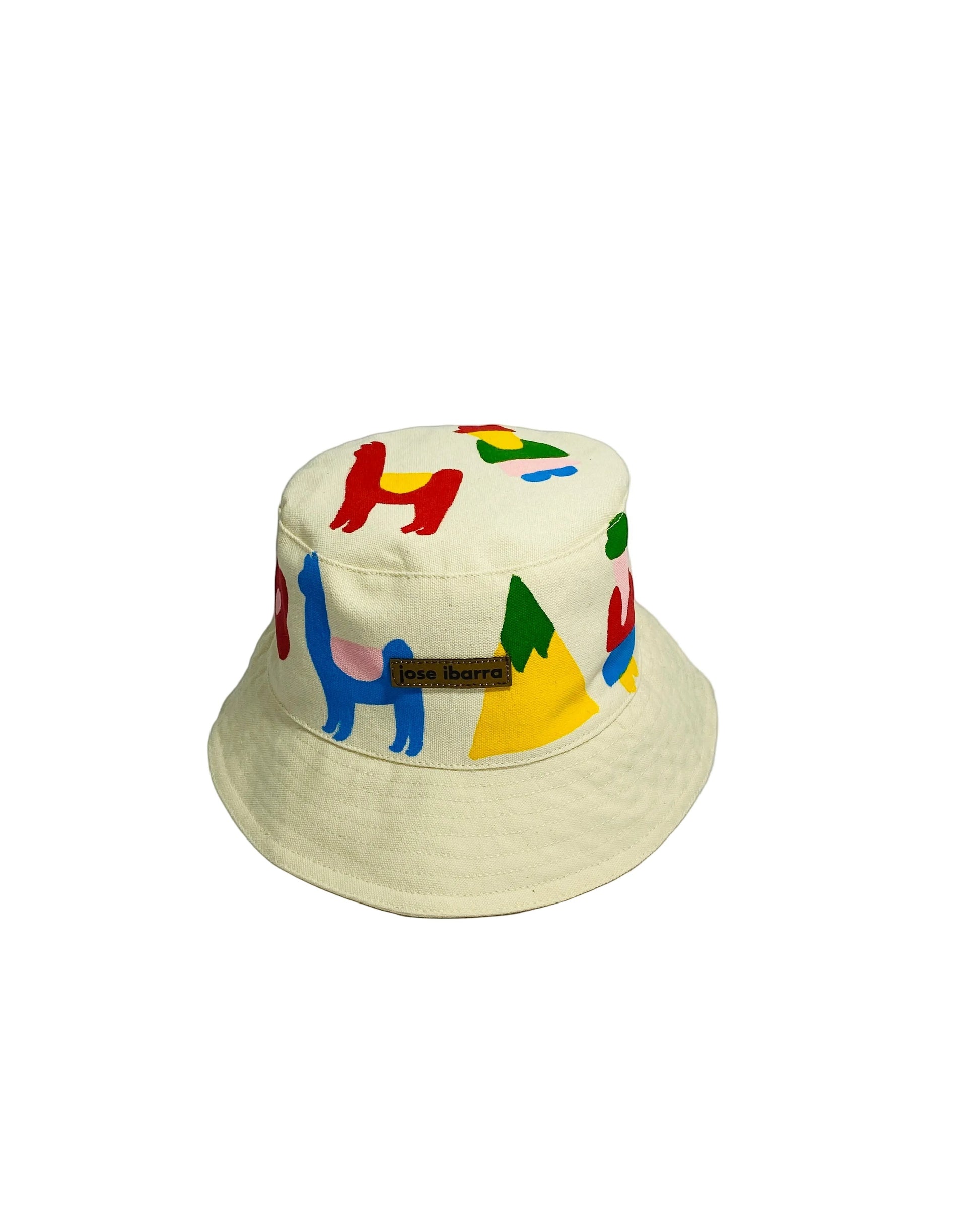 Jose Ibarra cream cotton bucket hat with hand-painted colorful llama, mountain, and abstract designs.
