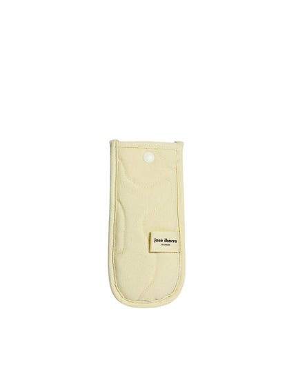 Jose Ibarra pale yellow quilted cotton phone case with snap closure and internal lining. Hand-painted design.